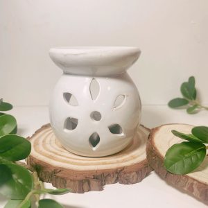 Μικρός λευκός καυστήρας με λουλούδι